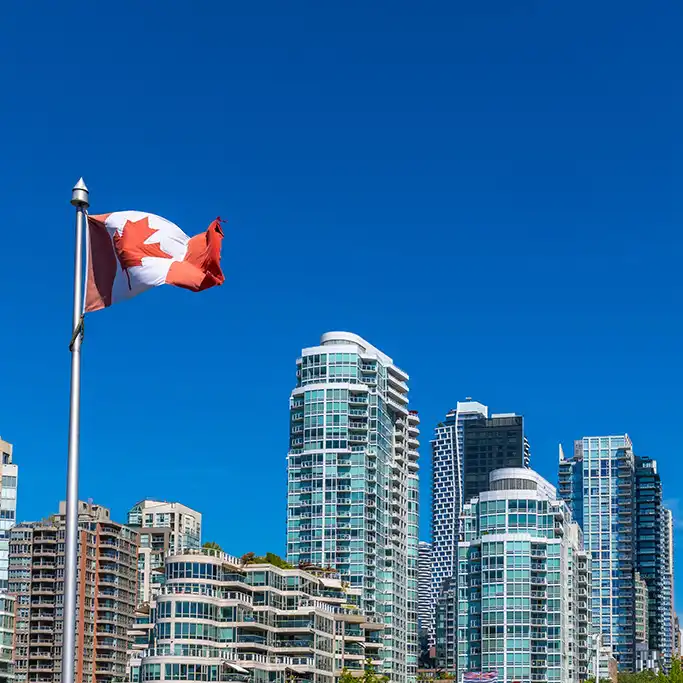 Canadian city skyline with national flag representing AI platform deployment in Canada